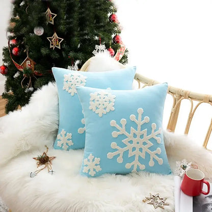 Light blue cushion cover with white embroidered snowflakes by DecorBites christmas snowflake for festive decor