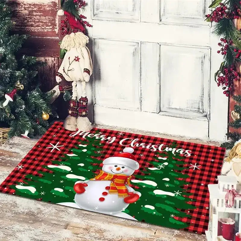 Red and green plaid decorbites christmas snowman non-slip floor mat featuring a smiling snowman with pine trees and snow