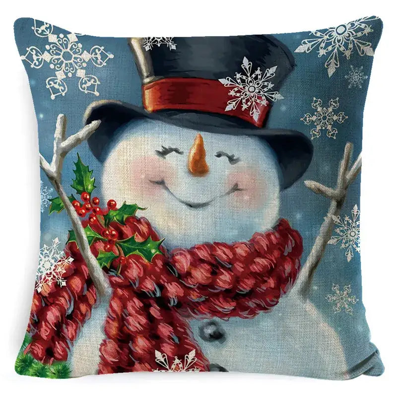 Cozy blue linen pillow cover featuring decorbites christmas snowman with black top hat red scarf and holly berries for festive decor