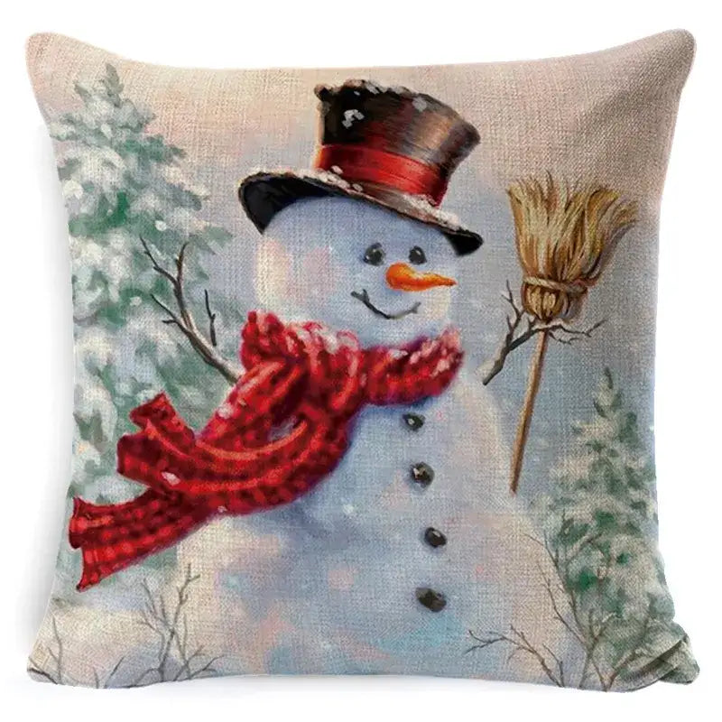Cozy beige linen pillow cover featuring a decorbites christmas snowman in a black top hat and red plaid scarf for festive decor