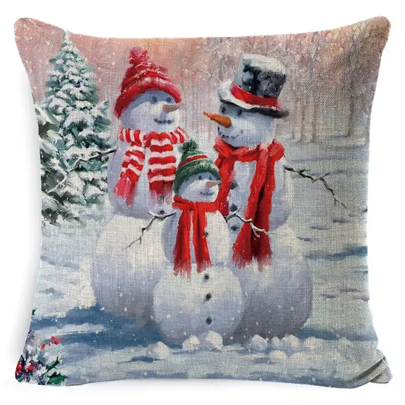 Square pillow cover by decorbites featuring christmas snowman and santa claus print on linen for festive decor
