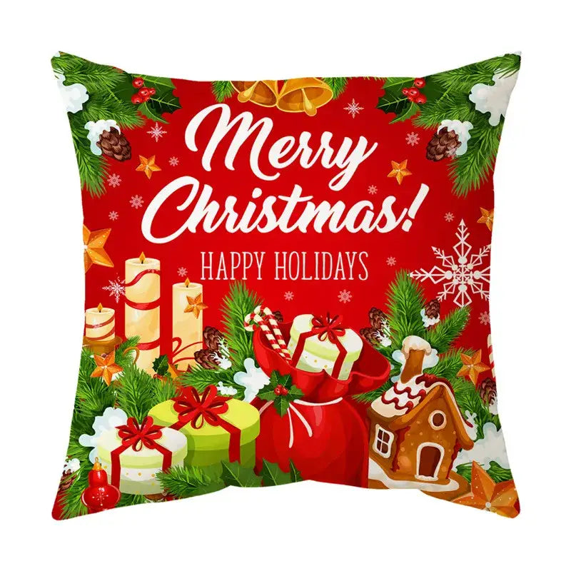 Red christmas-themed decorbites christmas sofa pillow cover featuring festive gifts gingerbread house and merry christmas text