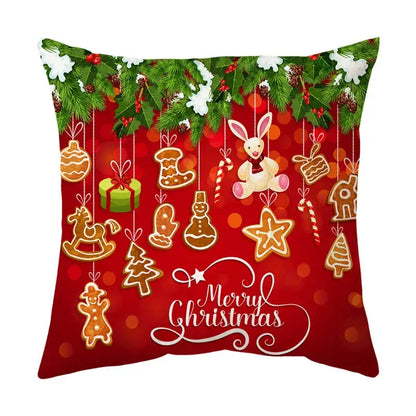 Red decorbites christmas sofa pillow cover featuring festive gingerbread cookies, plush bunny, and merry christmas script