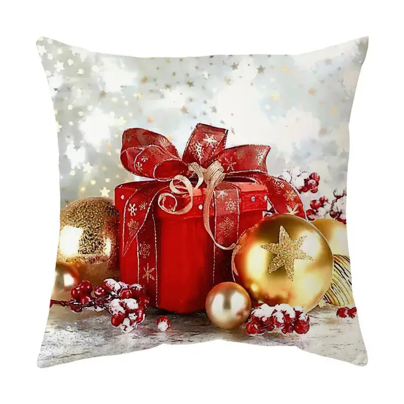 Red gift box with shiny gold star and red ribbon bow featured on DecorBites Christmas sofa pillow cover for home decor