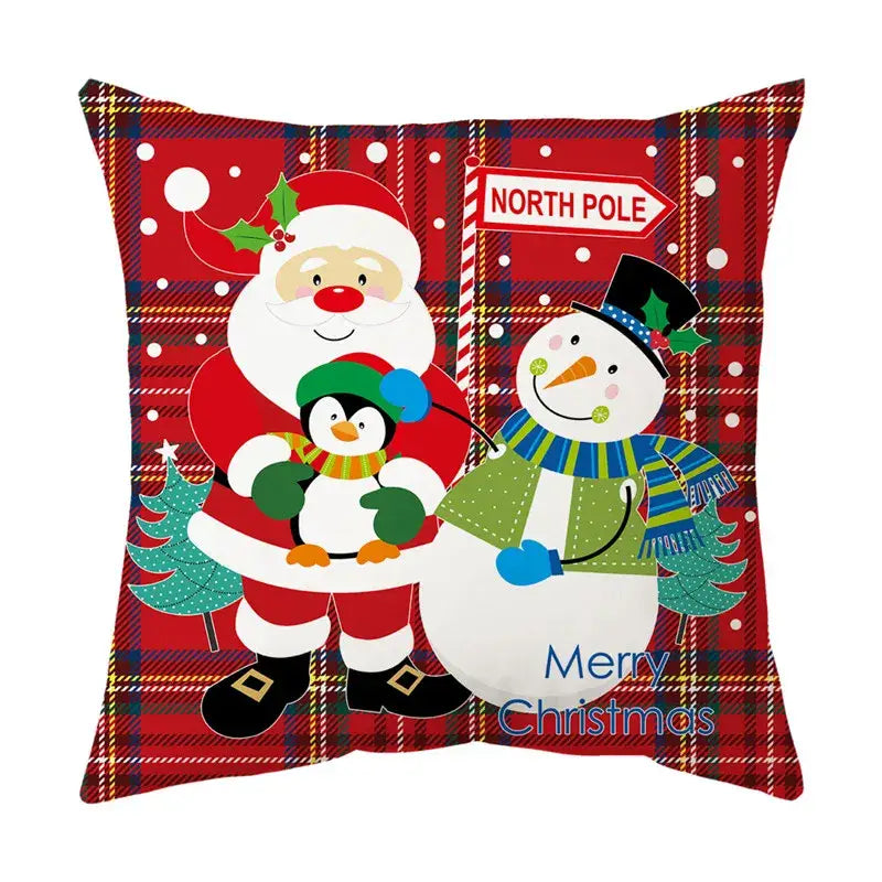 DecorBites christmas sofa pillow cover in red plaid featuring cartoon santa snowman and penguin with merry christmas text