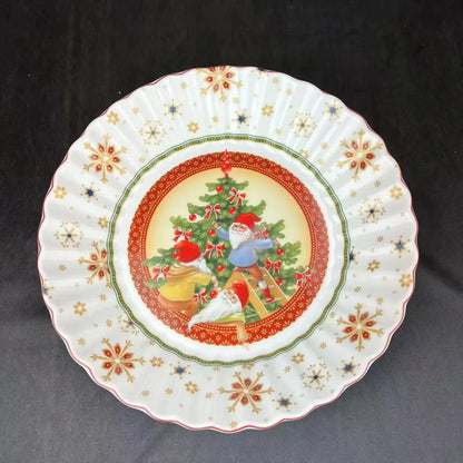 White ceramic plate with scalloped edge and santa elves Christmas tree design from decorbites Christmas tableware set