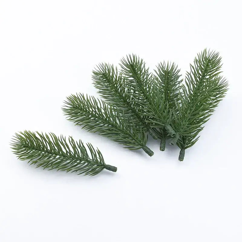 Green artificial pine branches with detailed needle-like foliage for christmas tree artificial plants by DecorBites™
