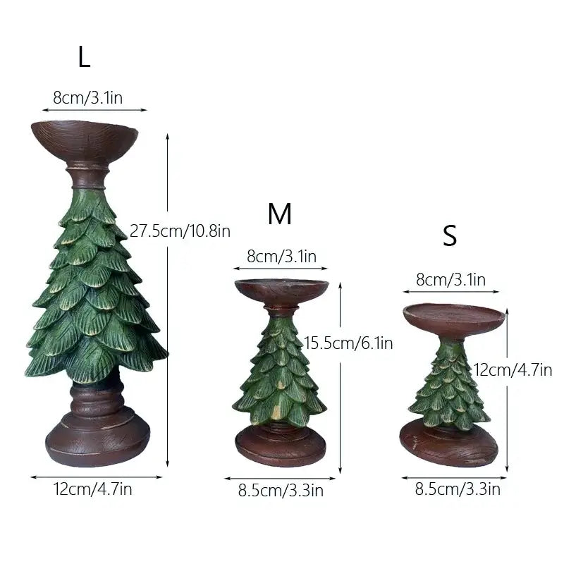 Set of three DecorBites christmas tree candle holders made of resin with dark brown bases and green foliage in varying heights