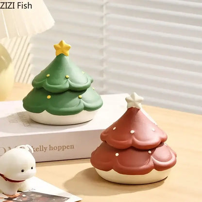 Two decorbites christmas tree ceramic ashtrays in green and reddish-brown with star detail for desktop use