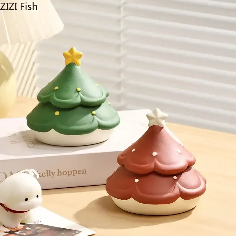 Two decorbites christmas tree ceramic ashtrays in green and reddish-brown with star detail for desktop use