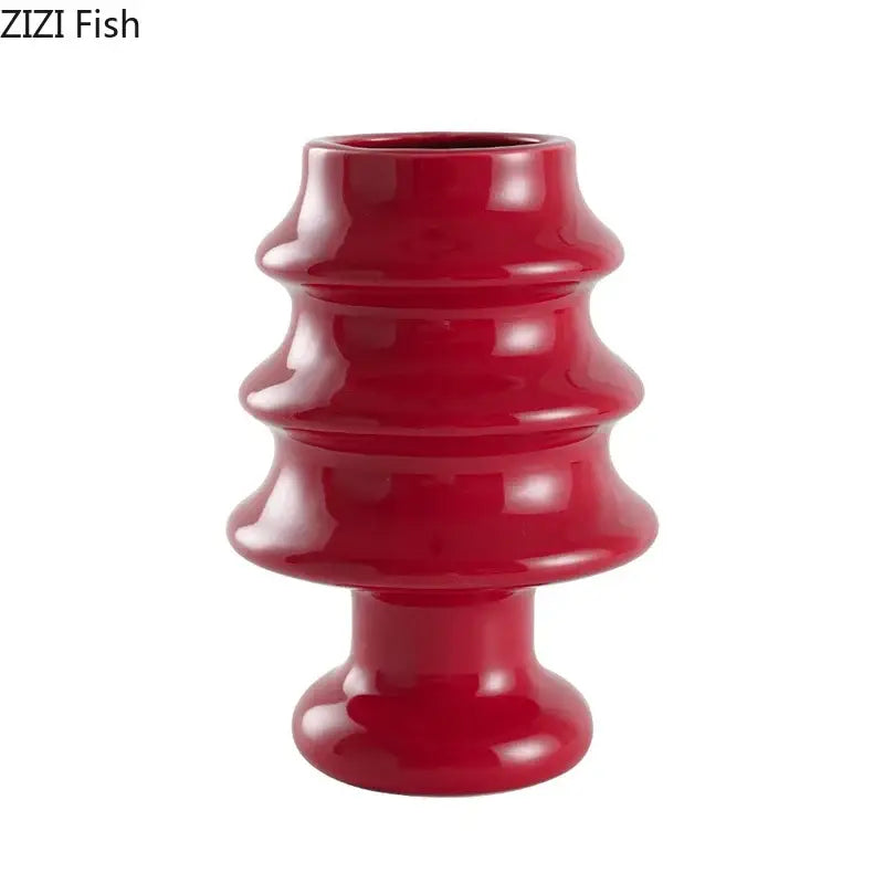 A glossy red ceramic vase with a tiered design from decorbites christmas tree ceramic collection for xmas decor