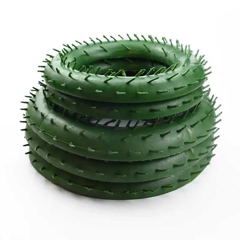 Green spiky rubber dog toy rings featured as part of decorbites christmas tree decor for wreaths and home accessories