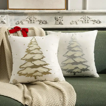 White throw pillows with embroidered gold and silver snow-covered christmas tree cushion cover decorative dots
