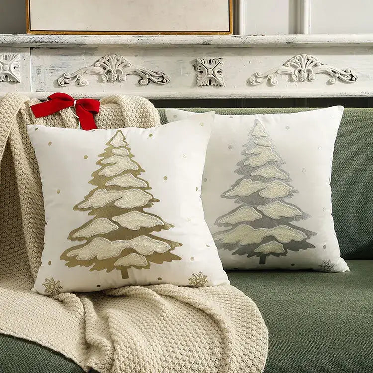 White decorbites christmas tree cushion covers featuring gold and silver embroidered snow-covered pine trees with metallic dots