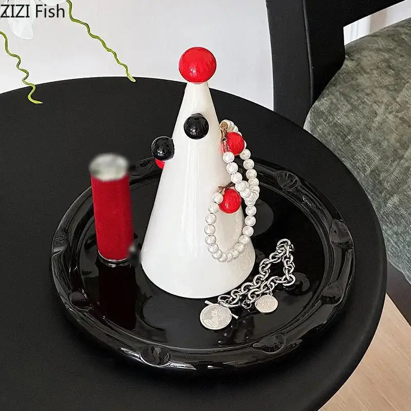 White ceramic clown-shaped jewelry stand with red and black accents for decorbites christmas tree earring storage display