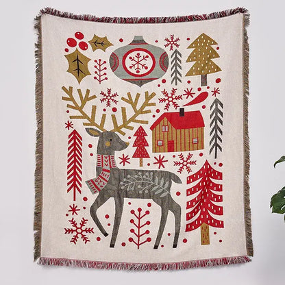 A beige woven decorbites christmas tree knitted throw blanket featuring a gray deer with festive christmas motifs