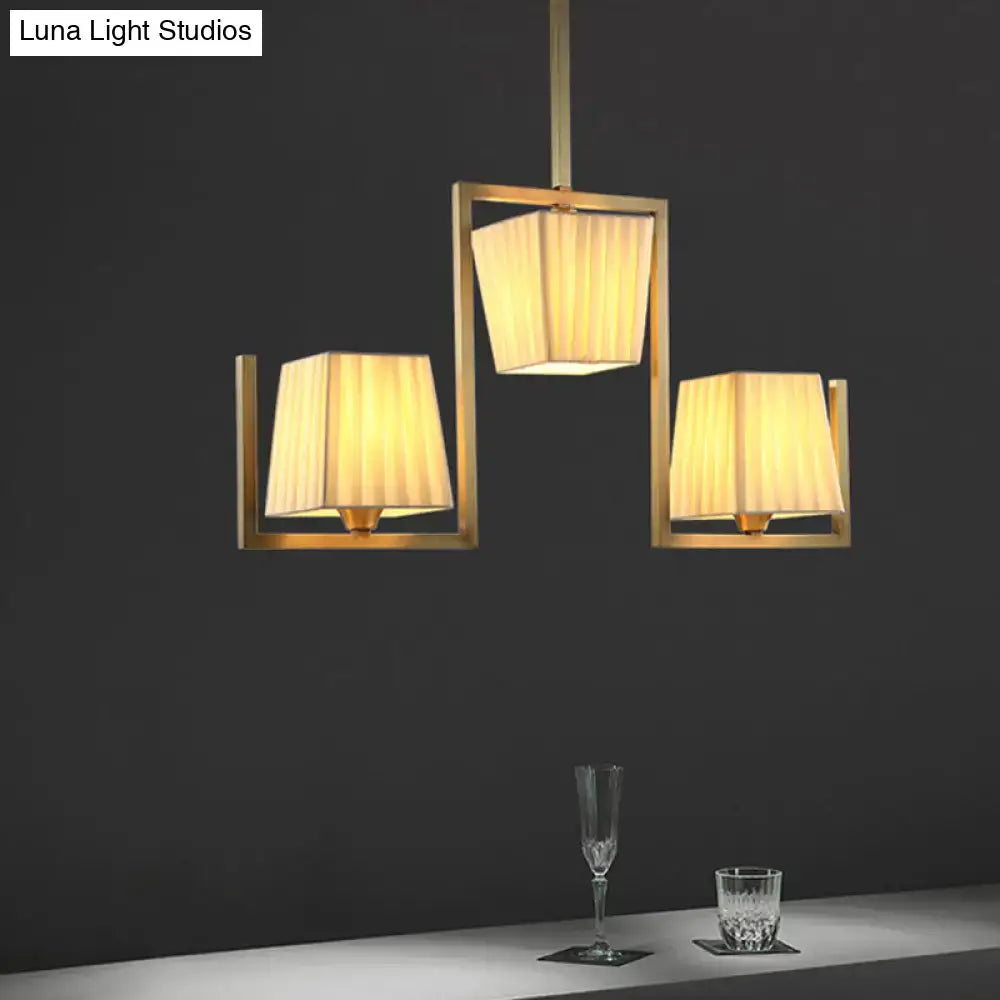 DecorBites classic brass island pendant light kit with three warm-toned pleated fabric shades for ceiling light use
