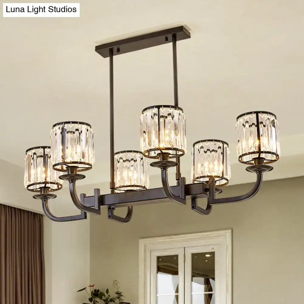 Elegant black metal chandelier with five crystal-encrusted cylindrical shades for dining room island lighting