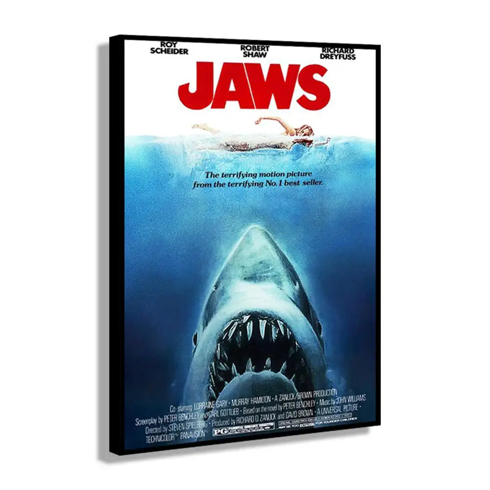 A framed DecorBites™ classic jaws movie poster canvas wall art featuring a menacing great white shark above a swimmer