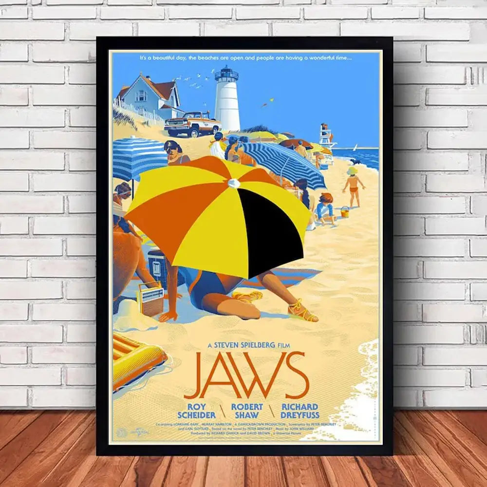 A framed vintage-style jaws movie poster canvas featuring a vibrant beach scene with a yellow and black umbrella