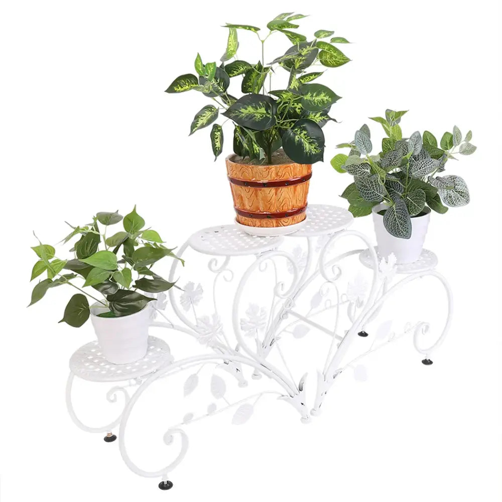 White wrought iron classic tall plant stand with ornate leaf scrollwork and three tiers for indoor outdoor use from decorbites