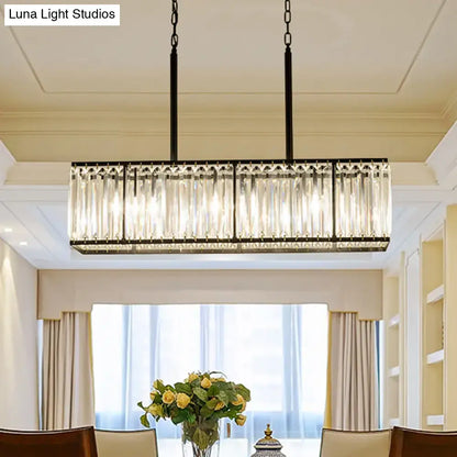 Decorbites clear crystal island pendant light with black metal frame and vertical crystal rods for modern dining rooms