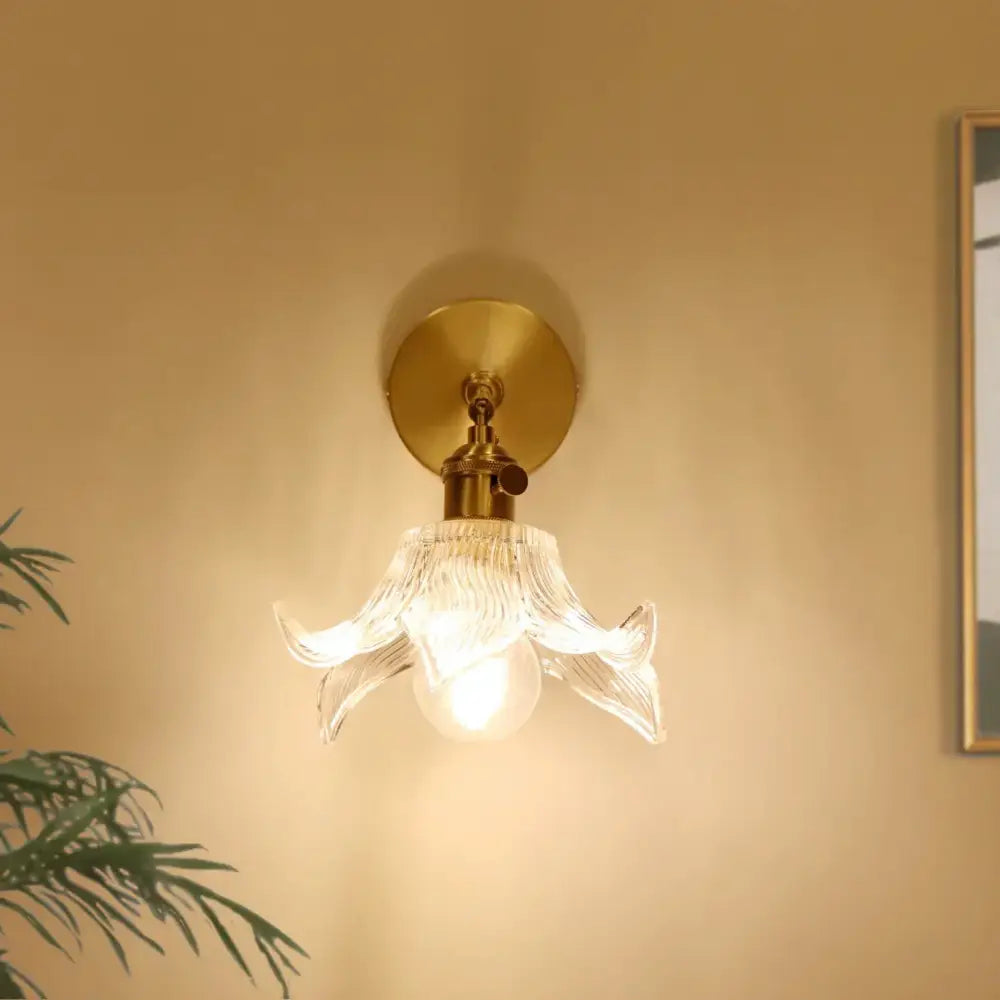 Decorbites clear flower glass wall lamp with brass pull chain and translucent flower-shaped glass shade for bedroom lighting