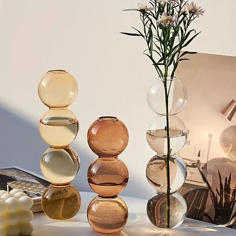 DecorBites™ clear glass bubble vase with amber and clear translucent spheres for modern home decor