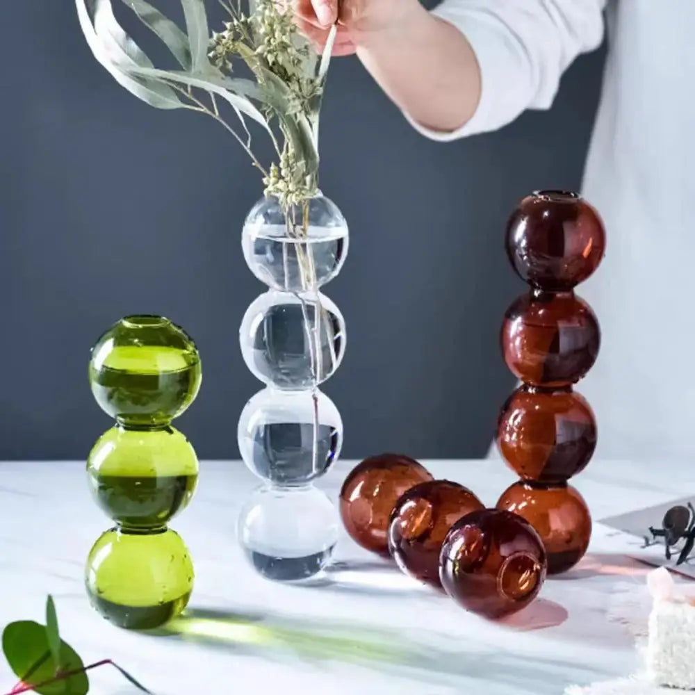 Clear glass bubble vase by decorbites featuring stacked spherical segments for elegant home decor