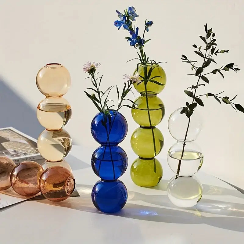 DecorBites clear glass bubble vases stacked in amber cobalt blue and lime green for vibrant home decor