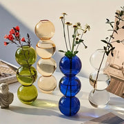 Stacked glass bubble vases in vibrant green amber and royal blue hues for home decor by decorbites clear glass bubble vase