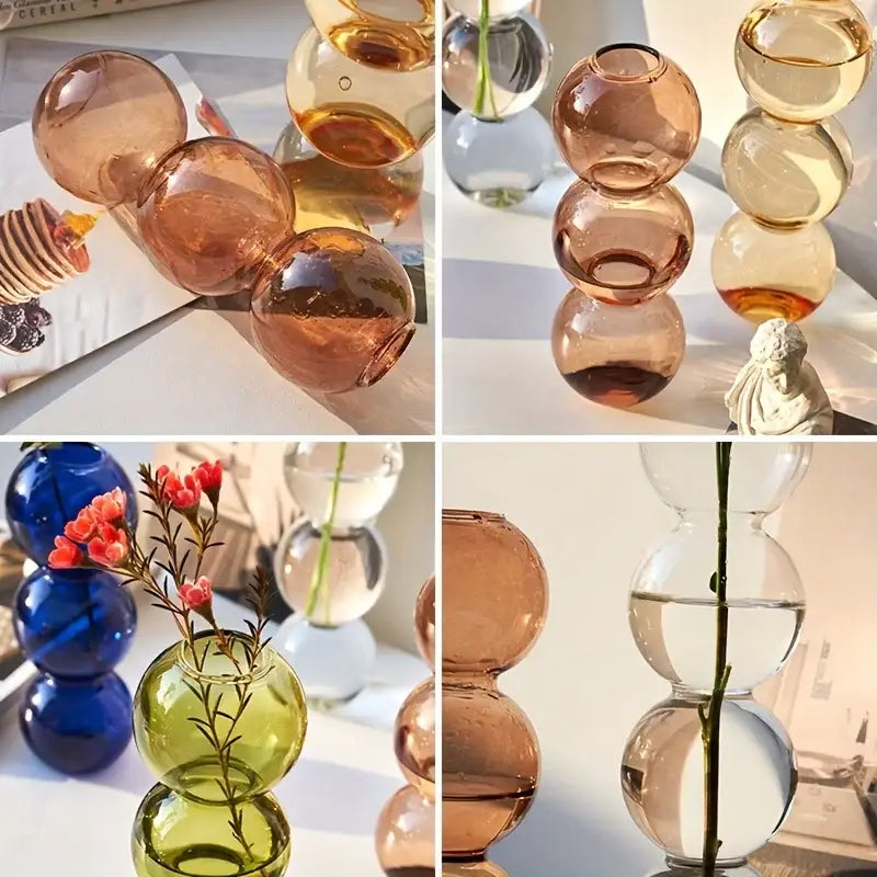 Stacked DecorBites™ glass bubble vases in amber green and blue hues feature spherical segments for elegant home decor