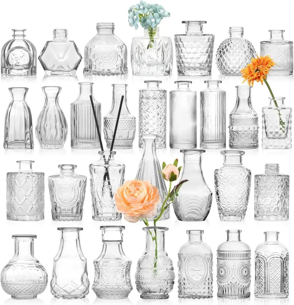 Decorbites clear glass bud vase bulk set featuring clear glass vases with intricate etched and faceted designs holding flowers