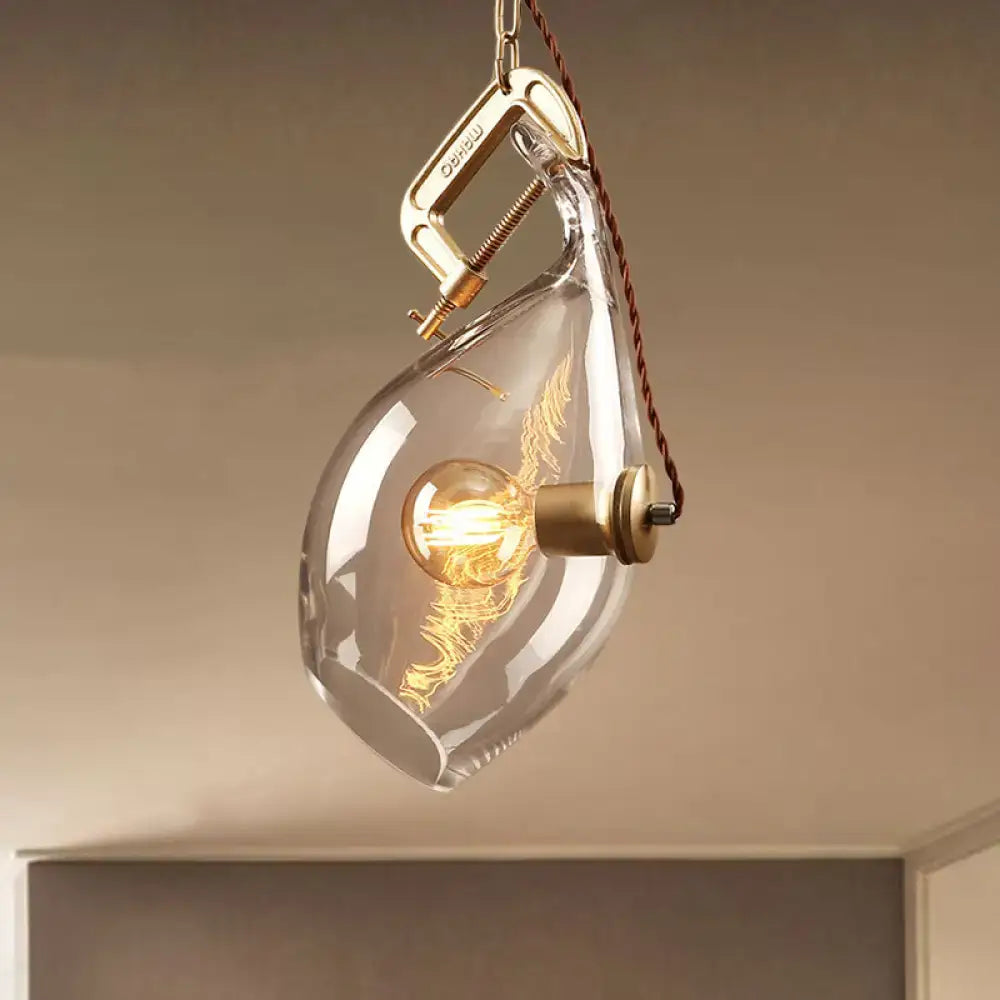 DecorBites clear glass fish pendant light with brass clamp and exposed filament bulb for modern restaurant lighting