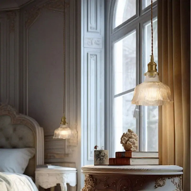 A vintage-style pendant light with brass fixture and translucent ribbed glass shade from Decorbites clear glass led collection