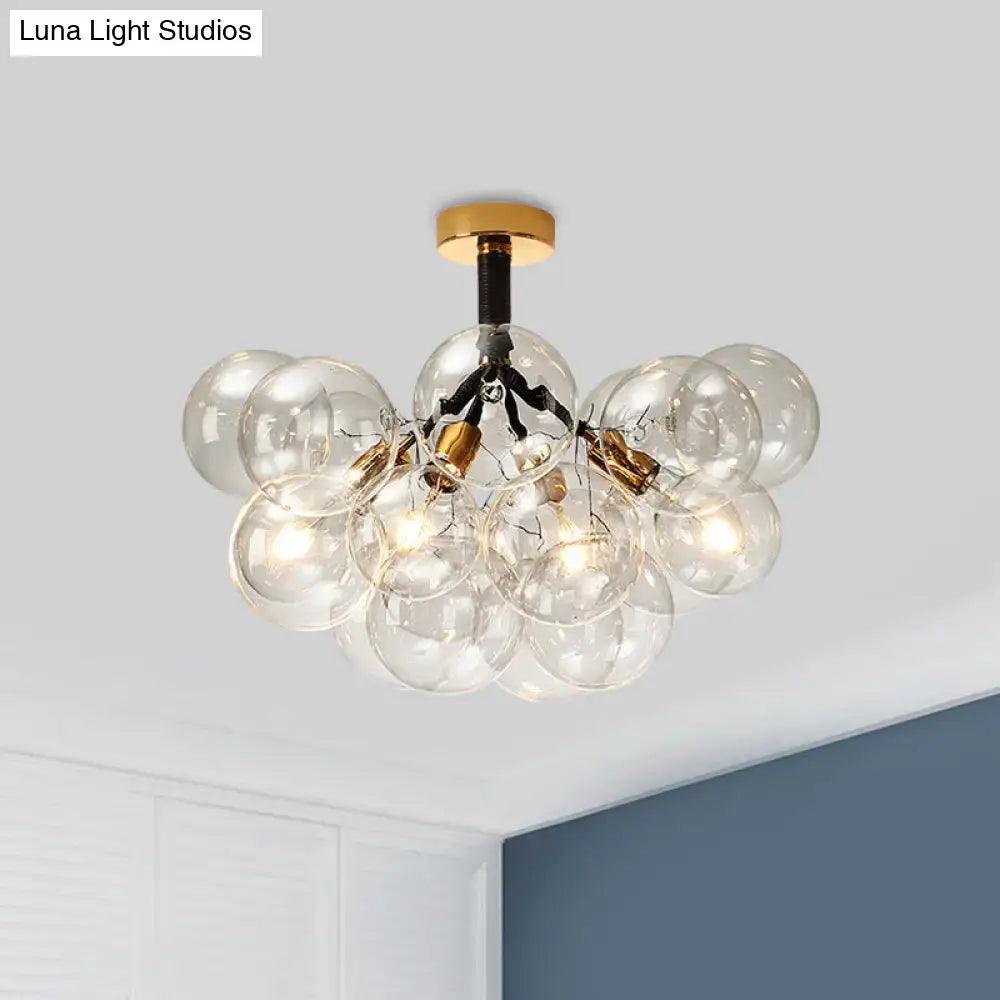 Decorbites™ clear glass semi flush ceiling light with brass accents and black wiring for foyer illumination