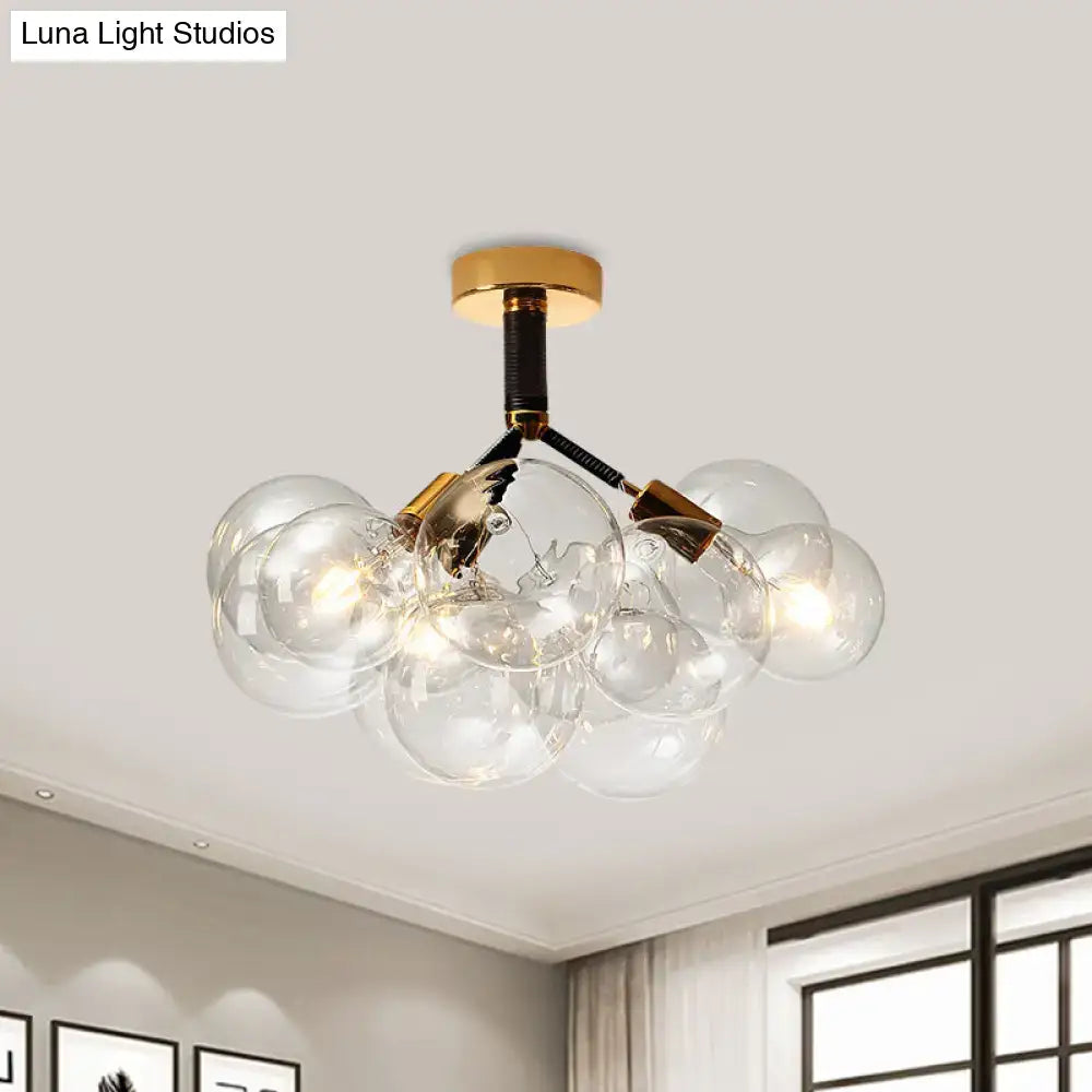 Decorbites clear glass semi flush ceiling light with modern bubble design brass accents for foyer illumination