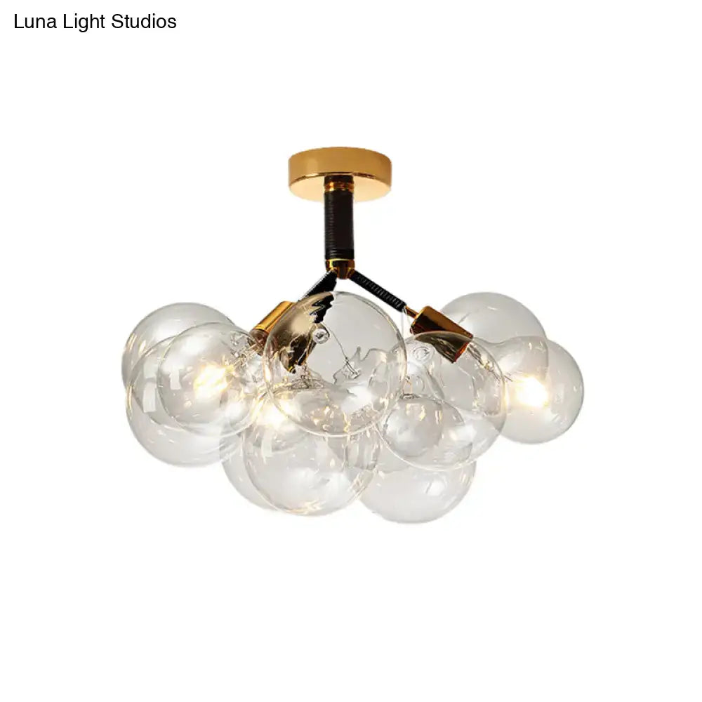 Decorbites clear glass semi flush ceiling light with brass arms and globe bulbs for foyer and corridor illumination