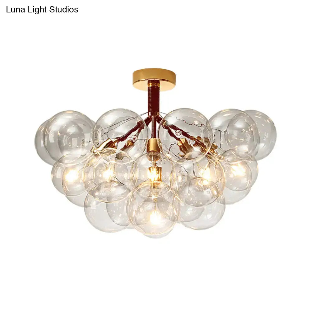 Gold-toned DecorBites semi flush ceiling light with clear glass bubble design for foyer and corridor illumination