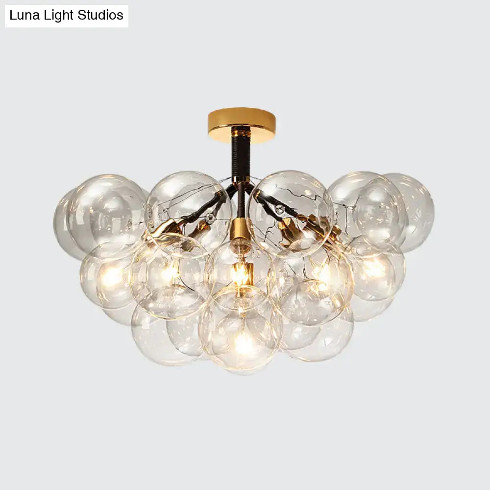 Gold-toned DecorBites™ semi flush ceiling light with clear glass bubbles for foyer and corridor illumination