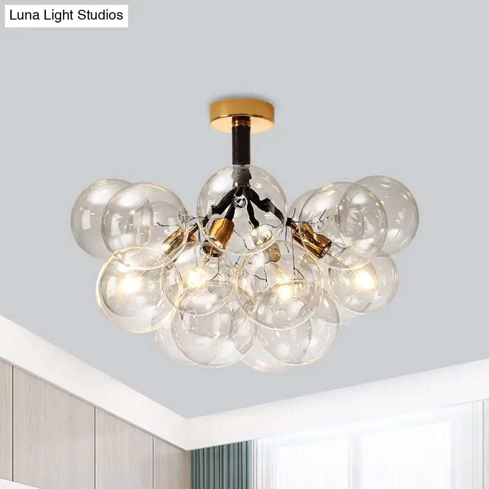 DecorBites™ clear glass semi flush ceiling light with gold metal accents and exposed bulbs for foyer illumination