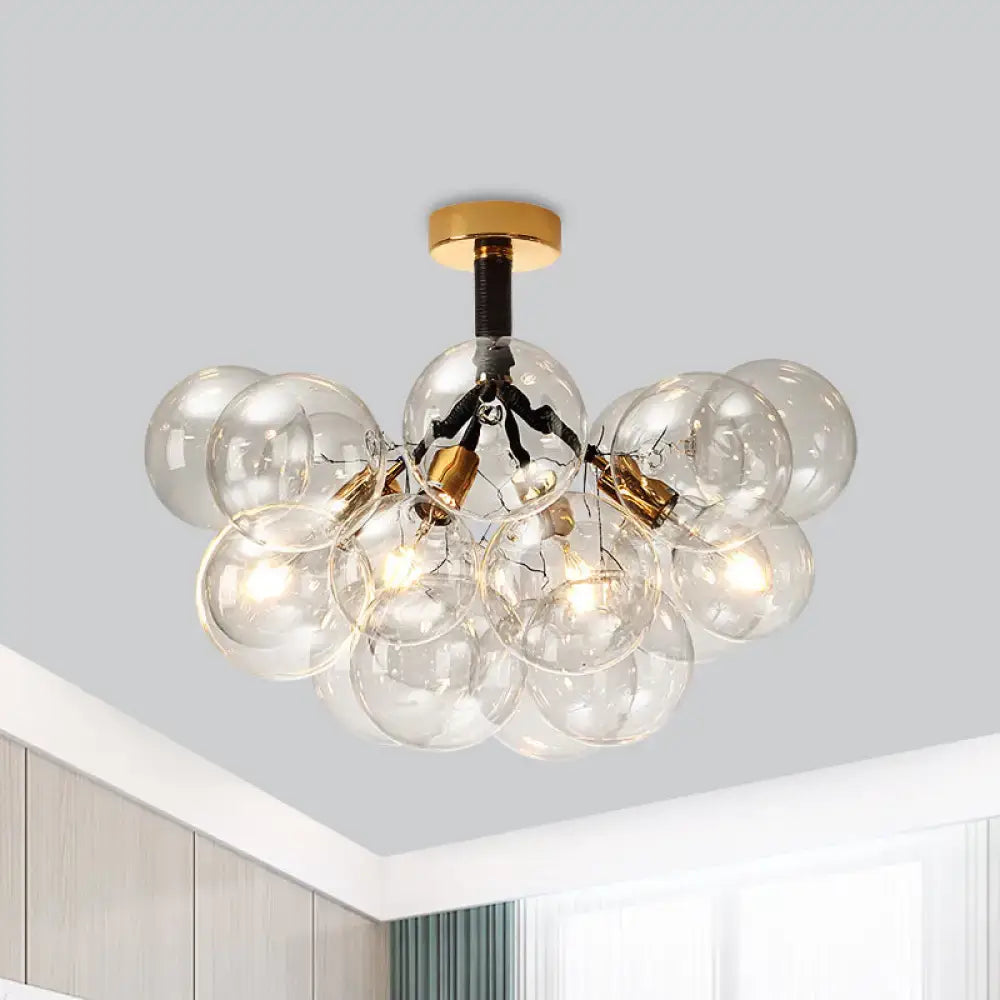 DecorBites™ clear glass semi flush ceiling light with gold-toned metal bubble design for foyer illumination