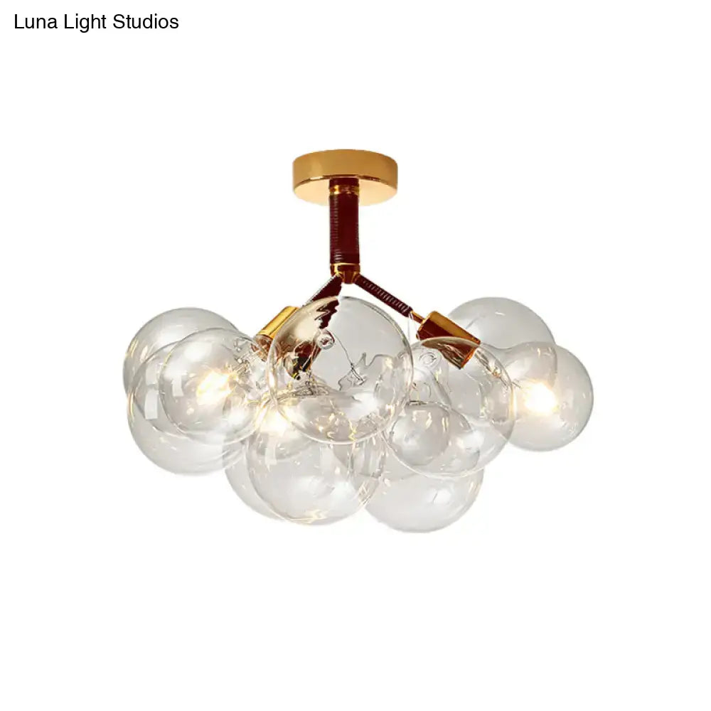 Gold-toned decorbites semi flush ceiling light with clear glass globe bulbs for foyer and corridor illumination