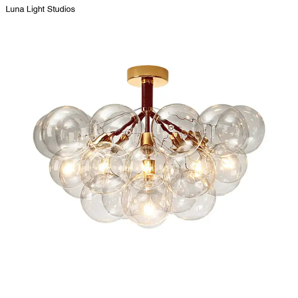 Gold-toned semi flush ceiling light with clear glass bubbles for contemporary foyer and corridor illumination by DecorBites