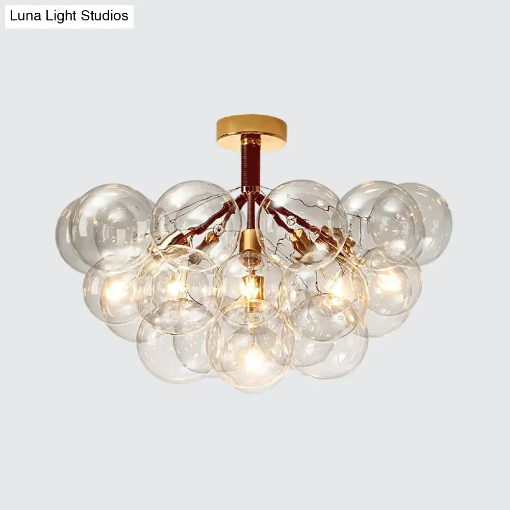 Gold-toned DecorBites™ clear glass semi flush ceiling light with bubble design for foyer and corridor illumination