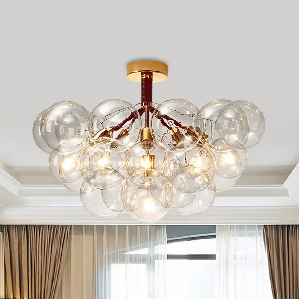 Modern DecorBites™ clear glass semi flush ceiling light with gold metal accents and filament bulbs for foyer illumination