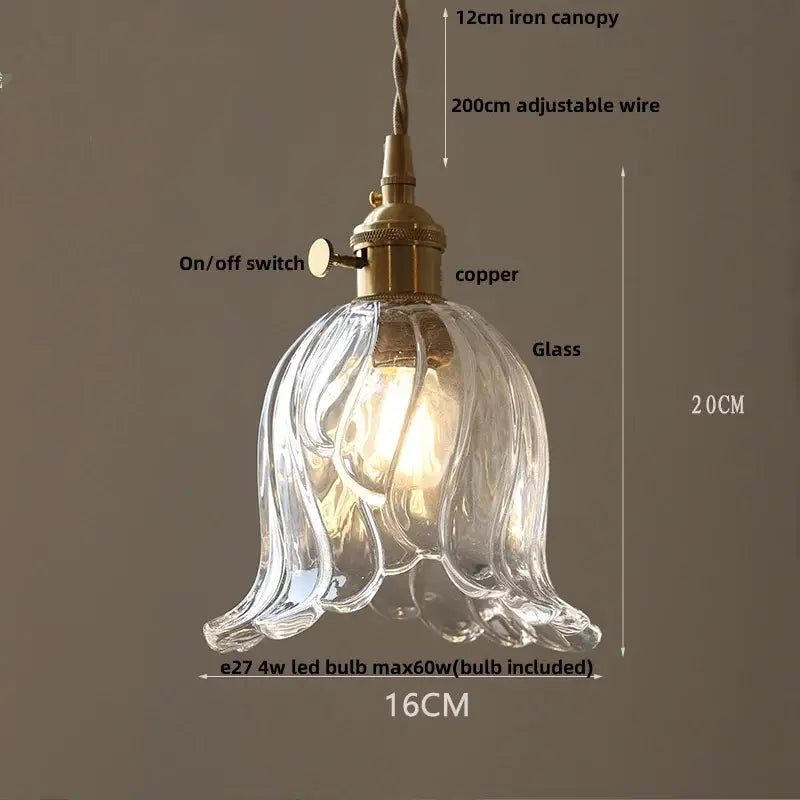 Clear glass pendant light with fluted leaf design and brass copper hardware for dining room by Decorbites clear leaf