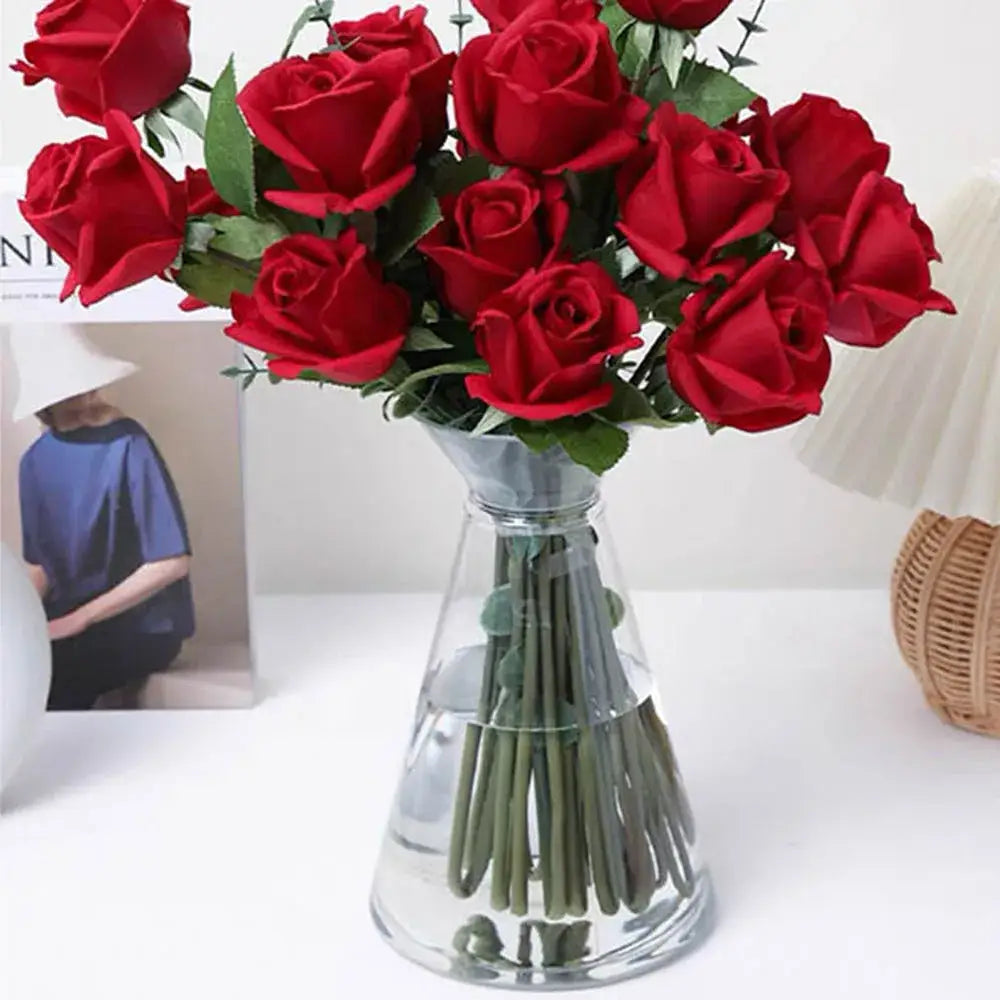 DecorBites™ clear nordic plastic vase with flared base holding vibrant red roses for hydroponic flowers display