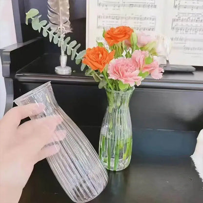 Clear glass plastic vase with vertical ribbed texture and slender neck for hydroponic flowers by DecorBites clear nordic style