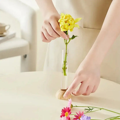 DecorBites clear vase with bamboo base hydroponic vase holding a single yellow flower for tabletop decoration